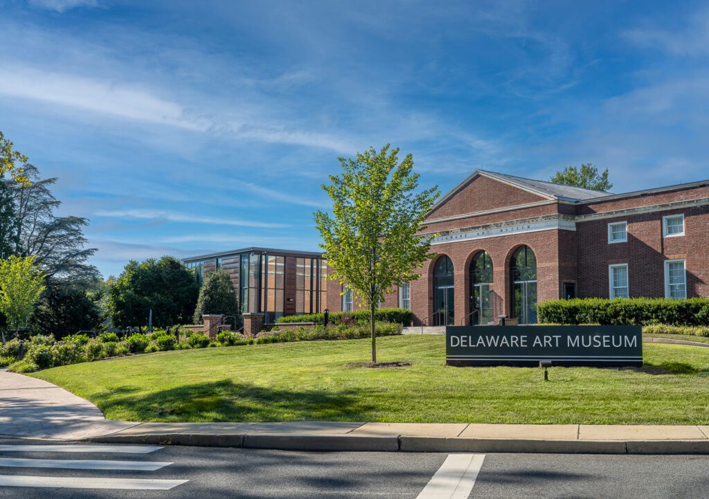 Museum Forecourt with Open Lawn and Framed Signage
