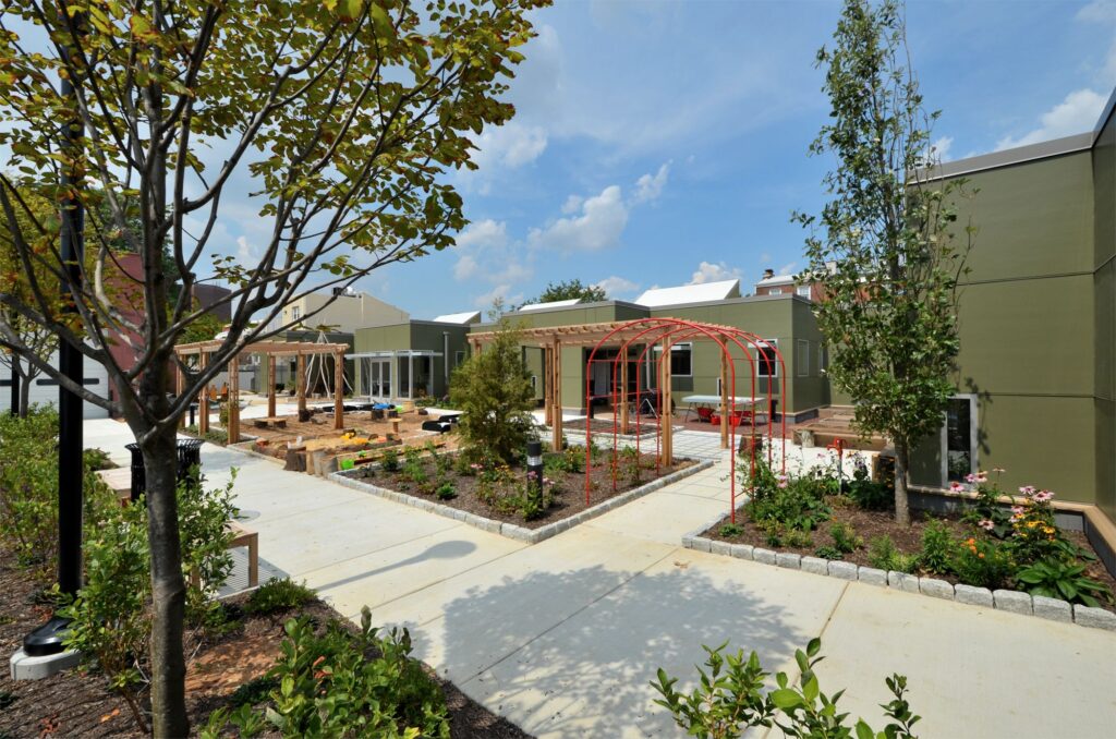 Outdoor Learning Garden with Playful Structure and Natural Engagement